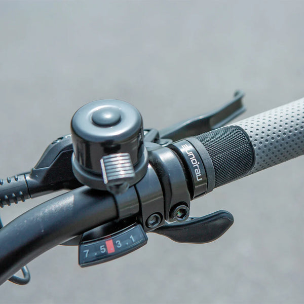 Equipped with a bell, providing an added layer of safety and convenience. Easily alert  pedestrians and other cyclists of your presence with a simple ring, ensuring a smoother, more secure journey.